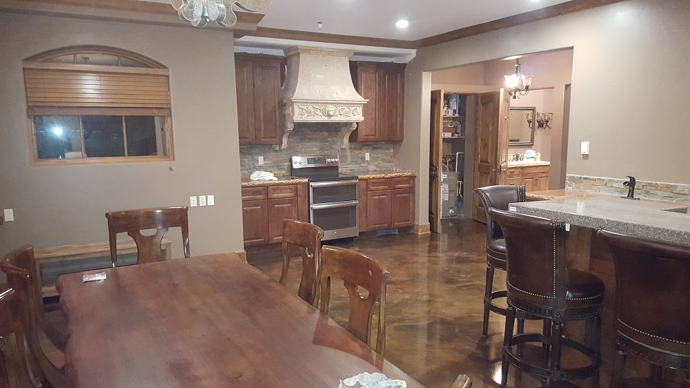 Kitchen with coffee brown epoxy reflector floor